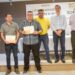 Premian a ganadores de diseño de logo del centenario