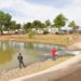 Realiza promotora inmobiliaria rellenado de agua en la laguna del náinari