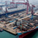 Las ganancias industriales de China mantienen el impulso, pero la economía sigue mostrando fisuras